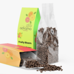 Adiramo Fruity Bloom 12oz light green and yellow coffee box package with citrus slice illustrations