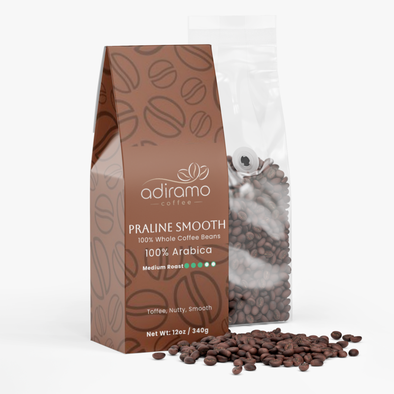 Adiramo Praline Smooth 12oz brown coffee bean pattern box package standing beside a clear valve bag of whole coffee beans
